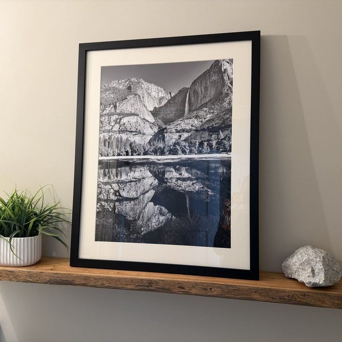 Verified review from Mark K: "We uploaded a photo to be framed for our new home and couldn't be happier. Both the photograph and frame look outstanding and came out much better than expected."